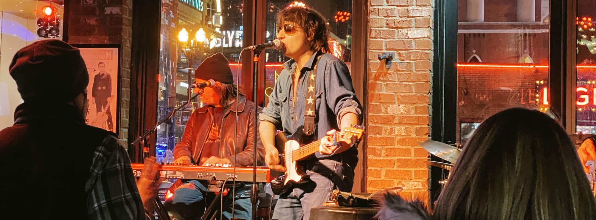 bar singer on guitar in Lafayette