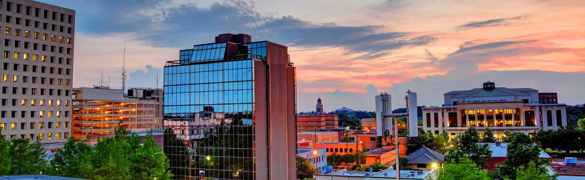 Neon color image of a band playing and people singing along